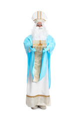 Full length portrait of Saint Nicholas with present on white background