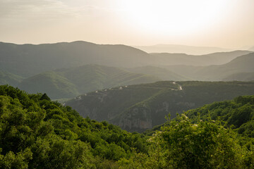 Winding road near Voidomatis River Vikos Gorge National Park, northern area of mainland Greece 