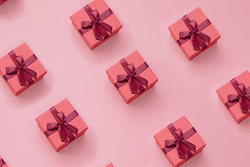 Collection of Christmas gift boxes on pink background