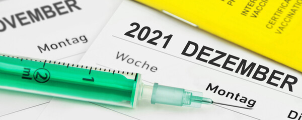 Deutscher Kalender 2021 Corona Pandemie Dezember mit Impfpass und Spritze