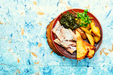 Salted herring with baked potatoes