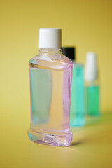mouthwash liquid in a container on table 