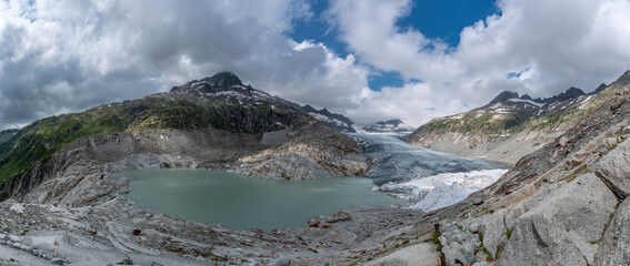 Mountainscape with the Rhone glacier and the source of the Rhone near Oberwald