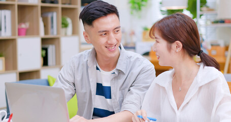 Fototapeta premium couple discuss finances at home