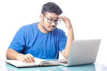 frustrated man Feeling exhausted while using laptop