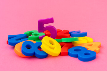 Pile of colored plastic numbers