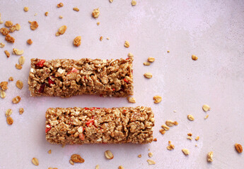 cereal fitness bars with berries on a purple background with a copy space