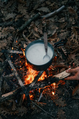 Boiling milk over the campfire
