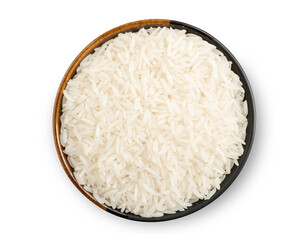 Uncooked rice in wooden bowl top view isolated on white background.