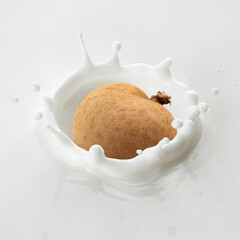 Longan falls into milk, yoghurt, sour cream, Splash