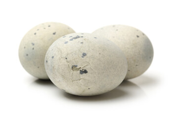 preserved duck eggs on white background
