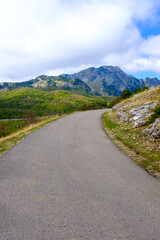 Fototapeta na wymiar Asphalt road in National park Durmitor Mouintains in Montenegro. 