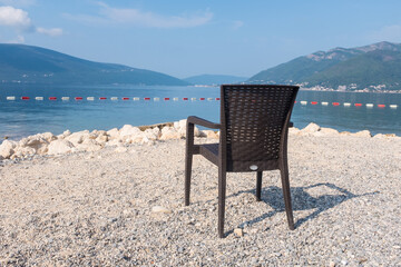 Empty chair and table with outdoor view. Tivat Porto Montenegro
