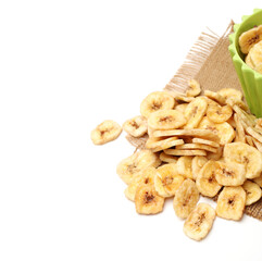 Banana chips on white background