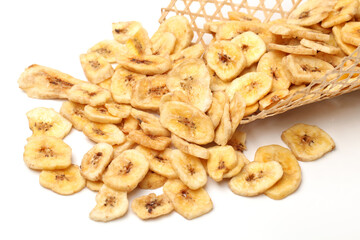 Banana chips on white background