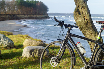 The bike and the sea. Cycling along the sea. A healthy lifestyle.