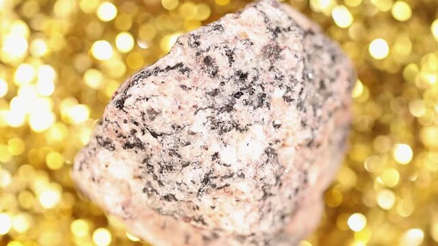 granite stone on a golden background.