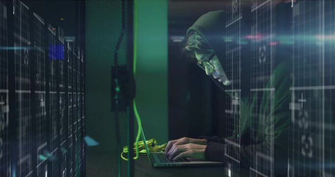 Animation of data processing over asian male hacker in hoodie with laptop by computer servers