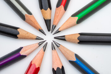nine sharp pencils on a white background 