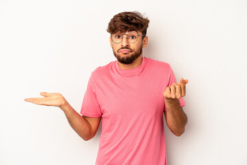 Young mixed race man isolated on grey background showing that she has no money.