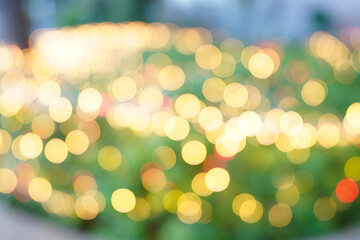 Fototapeta premium Abstract orange circle bokeh overlapping blurry background