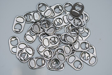 Keys from beer cans as a background, close-up. Beer festival 