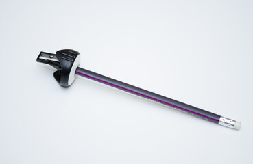 Pencil sharpener with a sharpener on top. Sharpener for sharpening graphite paper. Black and white pencil cutter. Professional sharpener 