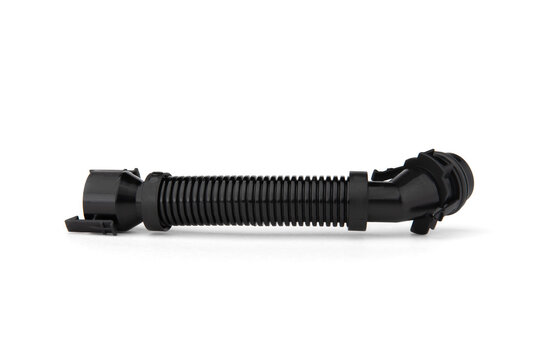 The ventilation hose of the crankcase gases of the car isolated on white background.