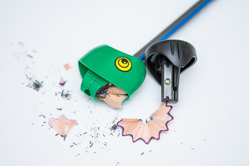 Pencil sharpener with a sharpener on top. Sharpener for sharpening graphite paper. Black and white pencil cutter. Professional sharpener 