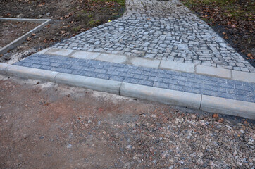 road surface preparation for asphalting. before asphalt machine arrives, underlying gravel or...