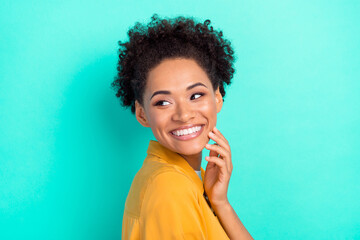 Photo portrait woman smiling looking copyspace dreamy isolated vivid teal color background