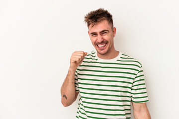 Naklejka premium Young caucasian man isolated on white background dancing and having fun.