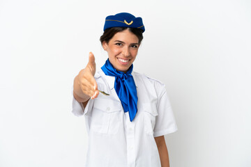 Airplane stewardess caucasian woman isolated on white background shaking hands for closing a good deal