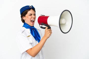 Airplane stewardess caucasian woman isolated on white background shouting through a megaphone