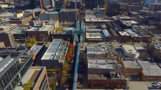 Aerial 4k Shot of Downtown Chicago Elevated Rail Line Into Downtown