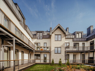 Yard of luxury residential townhouse. Modern architecture.