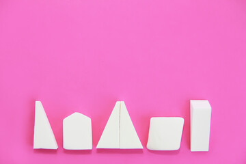 white foam sponges for applying cosmetic cream