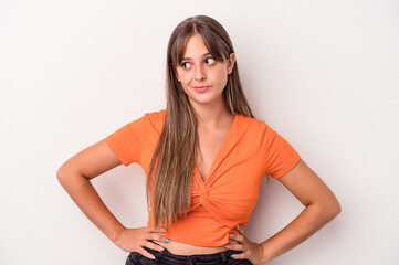 Young caucasian woman isolated on white background confused, feels doubtful and unsure.