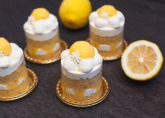 Lemon layer cake with lemon curd and fresh cream decorated like daisy flower