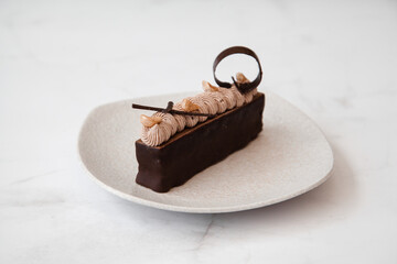 Hazelnut dark chocolate layer stick, delicacy dessert