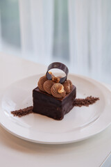 Hazelnut dark chocolate layer stick, delicacy dessert