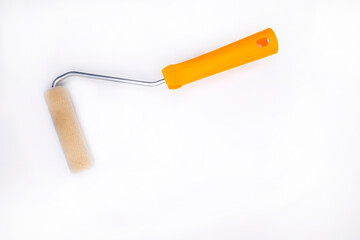 Paint roller on a white background, free space. Paint walls