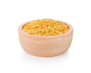Peeled split mung bean in wooden bowl on white background.