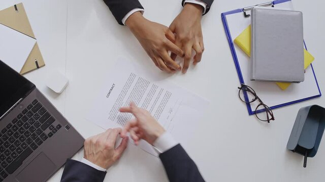 Male boss scolding female secretary for badly composed contract. Lorem ipsum