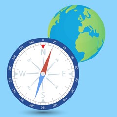 Compass near earth globe on blue background