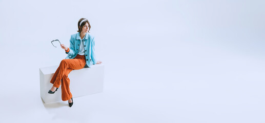 Flyer with young happy beautiful woman in retro style clothes, vintage outfit of 50s, 60s and 70s isolated on white background