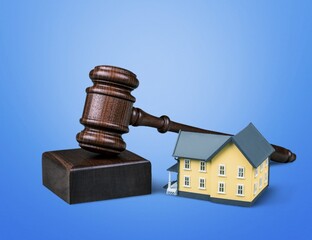 Gavel wooden and house for home buying or selling of bidding or lawyer, real estate and building concept.