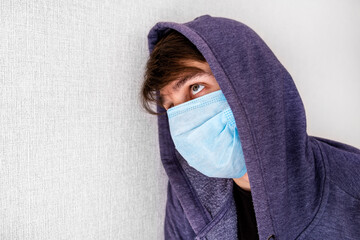 Young Man in a Flu Mask