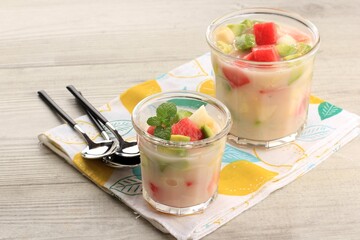Sop Buah or Es Buah is Mixed Fruit with Coconut or Simple Syrup, Served with Shaved Ice and add Condensed Milk to Add Creamy Swetened