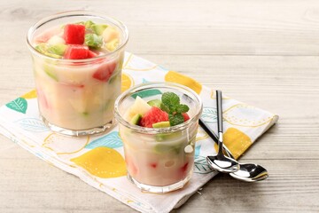 Sop Buah or Es Buah is Mixed Fruit with Coconut or Simple Syrup, Served with Shaved Ice and add Condensed Milk to Add Creamy Swetened
